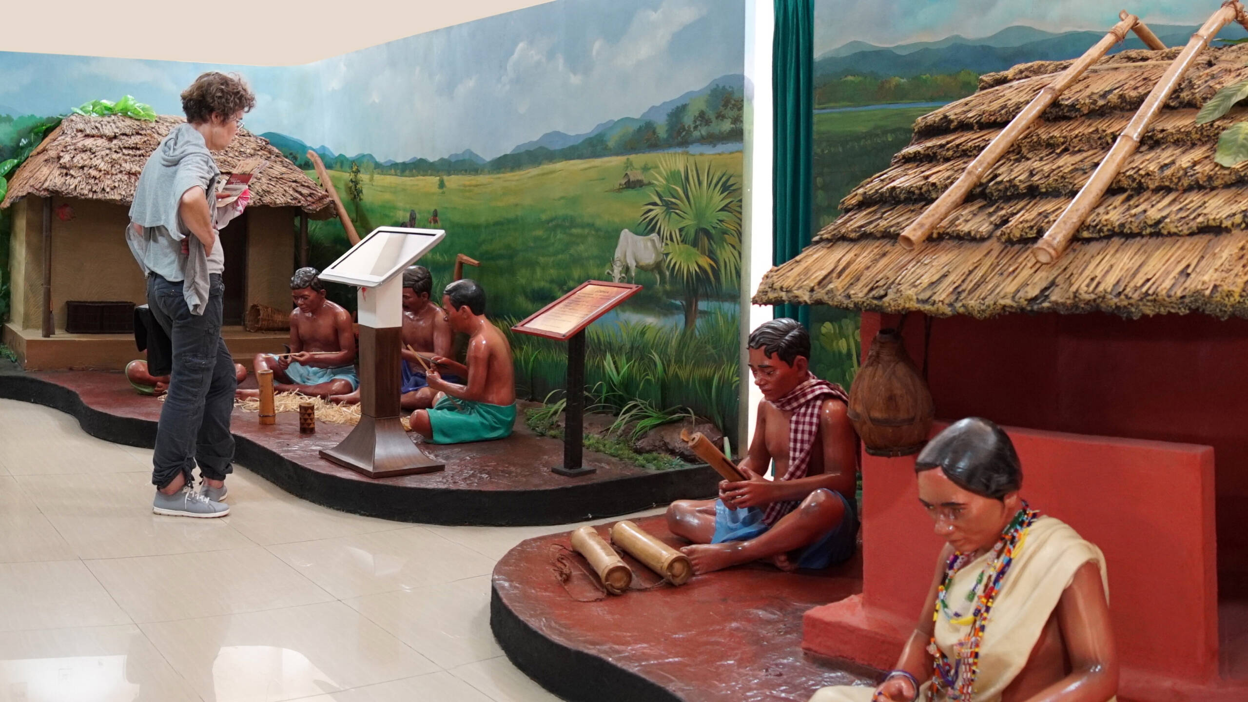 A visitor looking at the Interactive Kiosk at PVTG gallery of Odisha State Tribal Museum