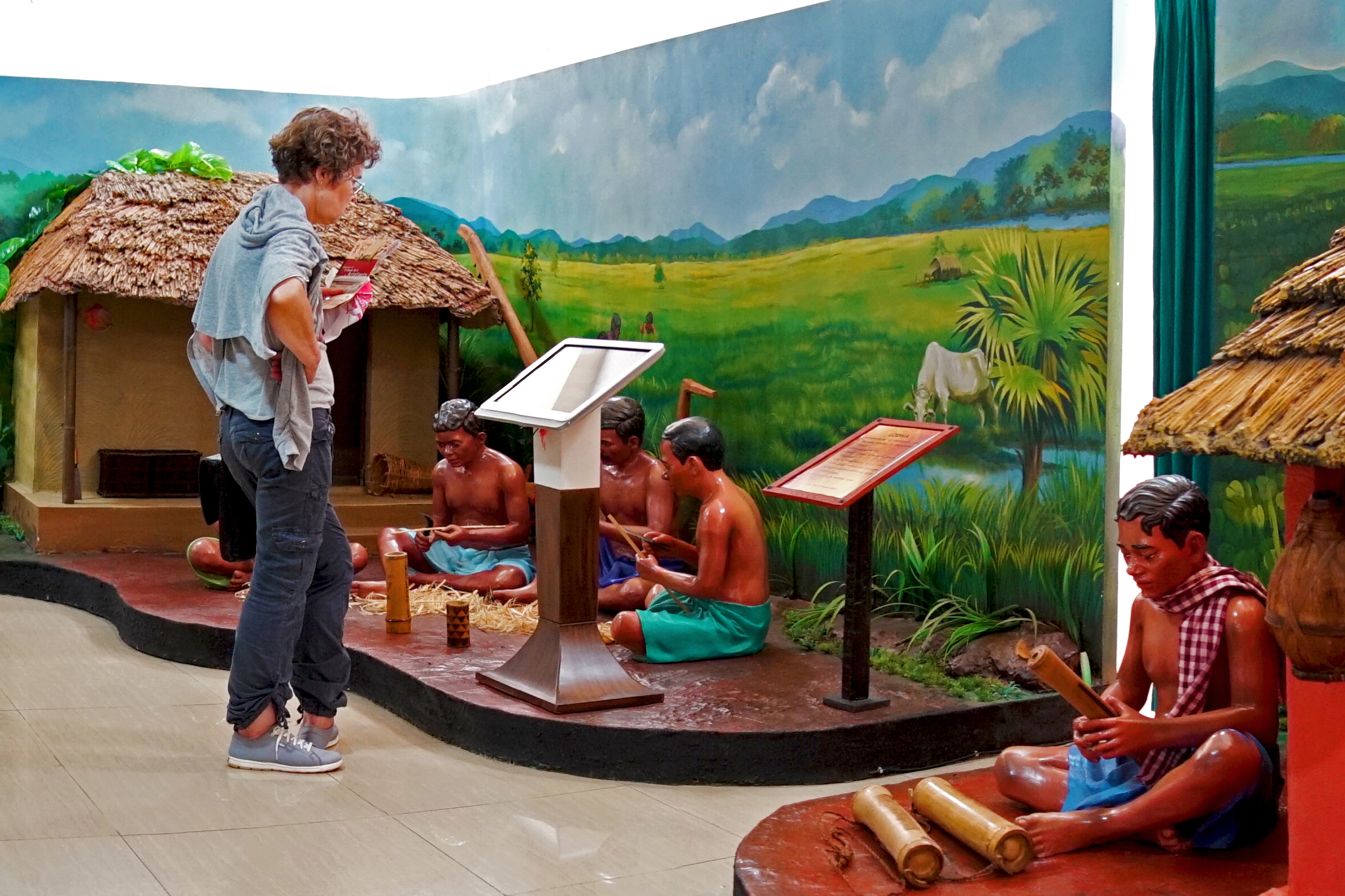 A visitor looking at the Interactive Kiosk at PVTG gallery of Odisha State Tribal Museum